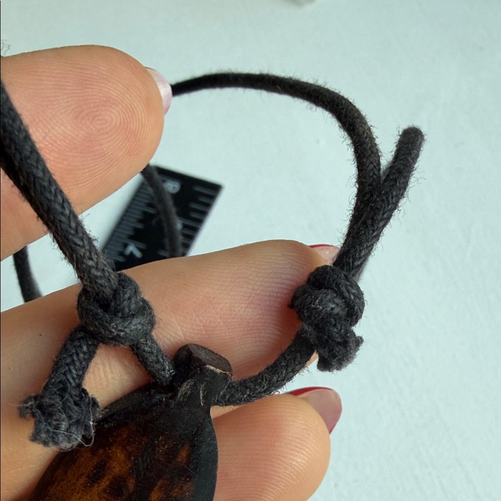 African Bone Face Mask Pendant Necklace on adjustable cord - Picture 7 of 8